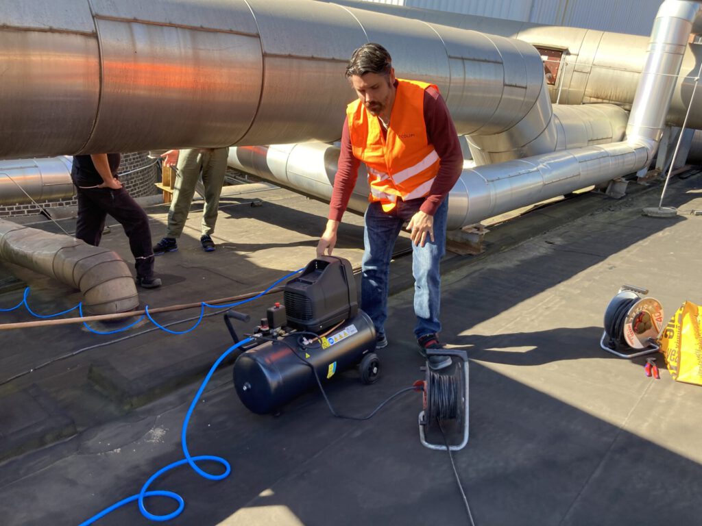 Founder and CTO Tyll Utesch extracting off-gas from the Continental site